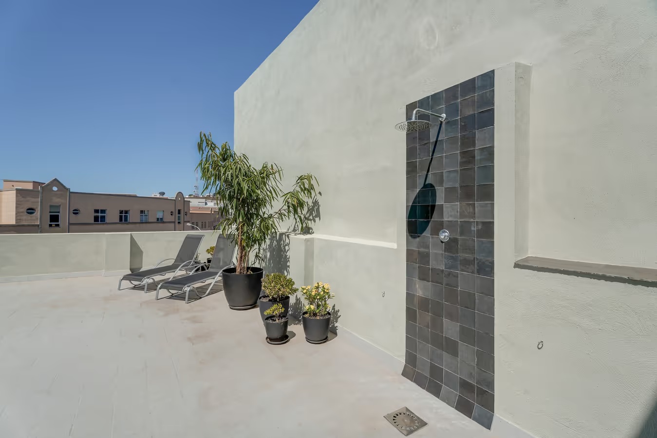 Outdoor shower on the terrace at Pescado Salado CoLiving